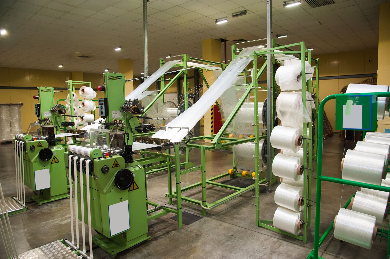Fabric draped on green machinery
